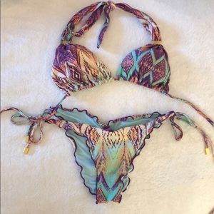 Paula Hermanny teal and purple multicolor bikini.
